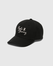 Explore style and comfort with the Psycho Bunny Men's Desert Baseball Cap - B6A549F200. This black cap, made from 100% cotton, features white embroidered text and a small bunny logo on the front, capturing the essence of West Coast living.