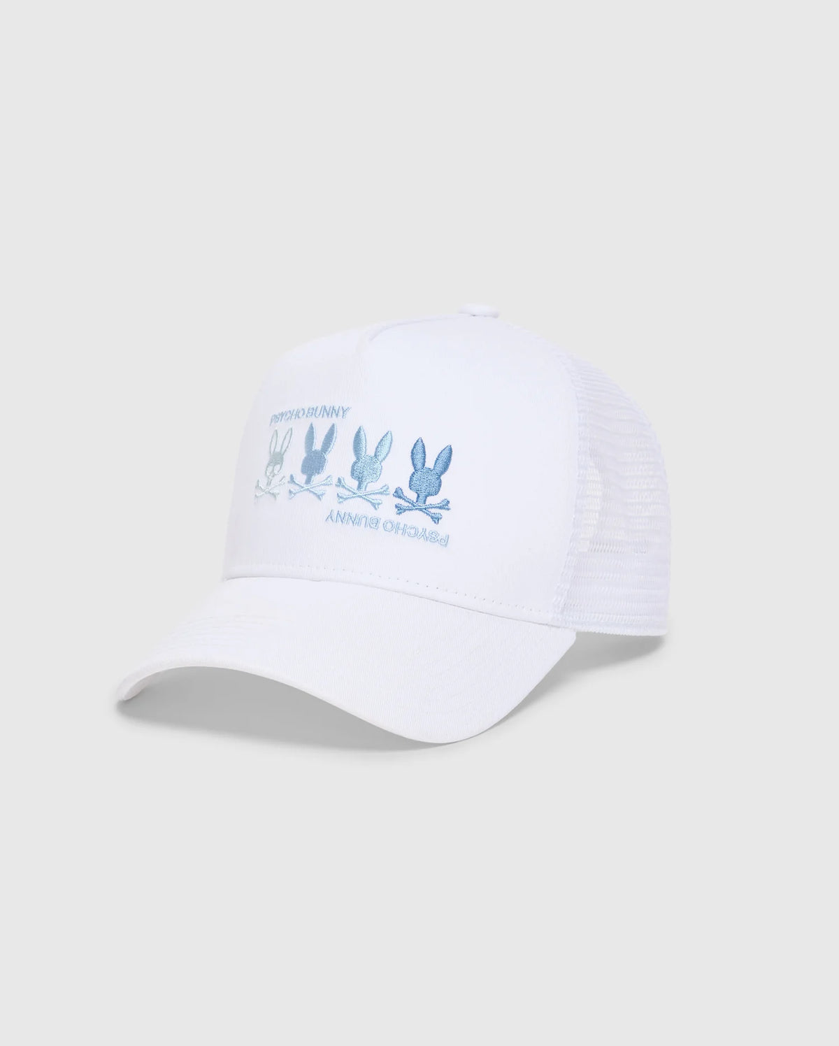 The MEN'S OCEANIA EMBROIDERED GRAPHIC TRUCKER HAT by Psycho Bunny features a streetwear vibe, with blue embroidered bunny graphics and "PSYCHO BUNNY" text on the front. It has a mesh back and an adjustable strap against a plain backdrop.