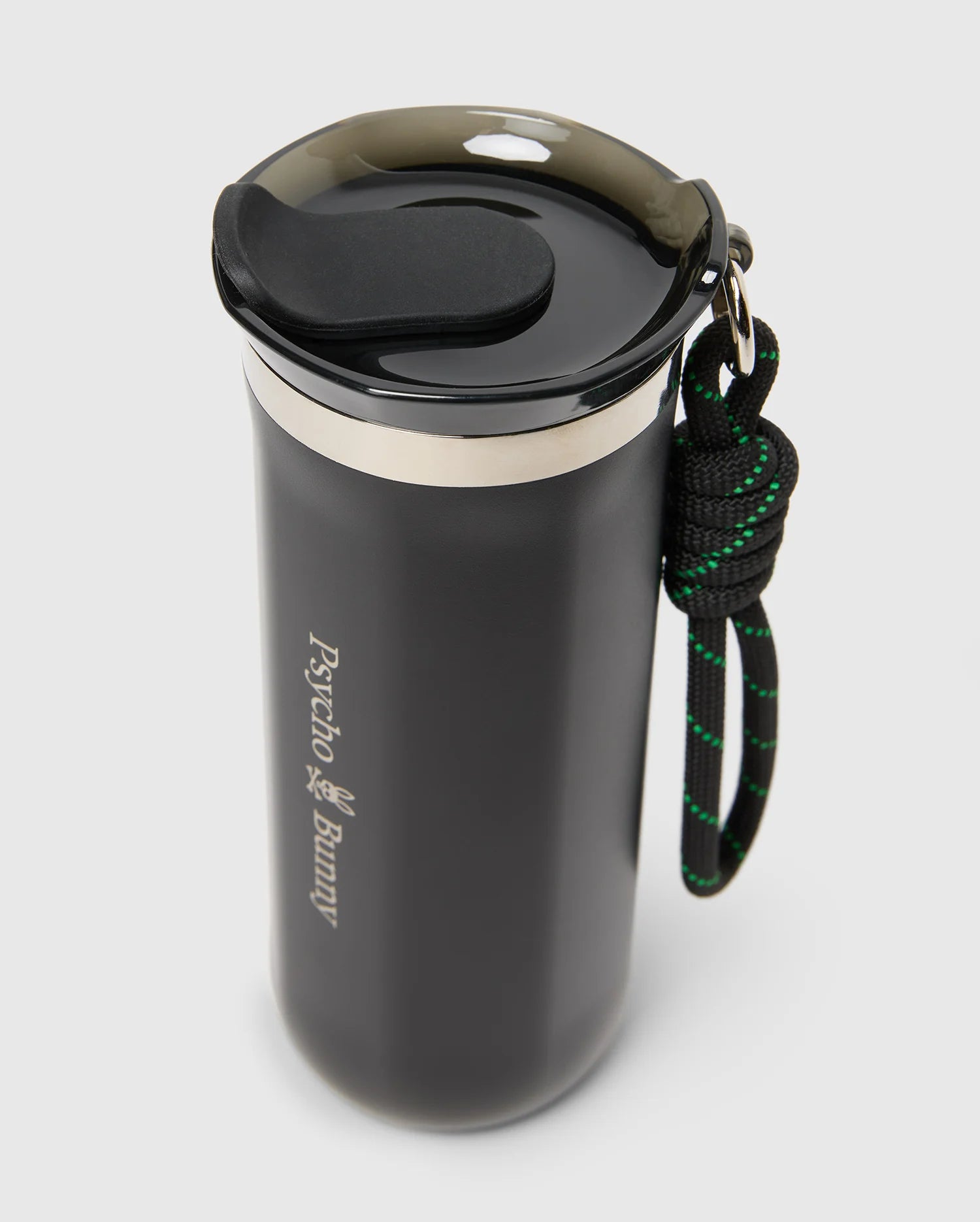 The MENS TRAVEL COFFEE MUG - B6A634F200 by Psycho Bunny is a black travel mug with an eco-friendly stainless steel build, featuring a screw-on lid, carrying handle, and the "Psycho Bunny" logo for stylish hydration.