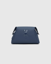 The Psycho Bunny MENS TOILETRY KIT - B6A636F200 is a navy blue triangular bag with an embossed rabbit ears and crossed bones design. Made from 100% polyester, it has adjustable straps and a minimalist style, ideal for organizing essentials on the go.