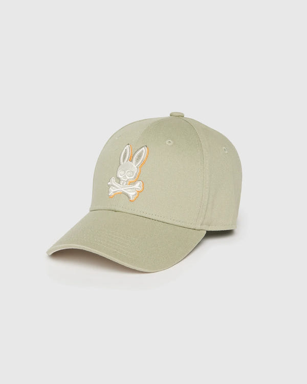 A Psycho Bunny MENS KAYDEN BASEBALL CAP - B6A677C200 made from durable cotton twill, featuring an embroidered bunny logo with crossbones underneath in white and orange stitching. The cap has a curved brim and six panels with ventilation eyelets on each panel.