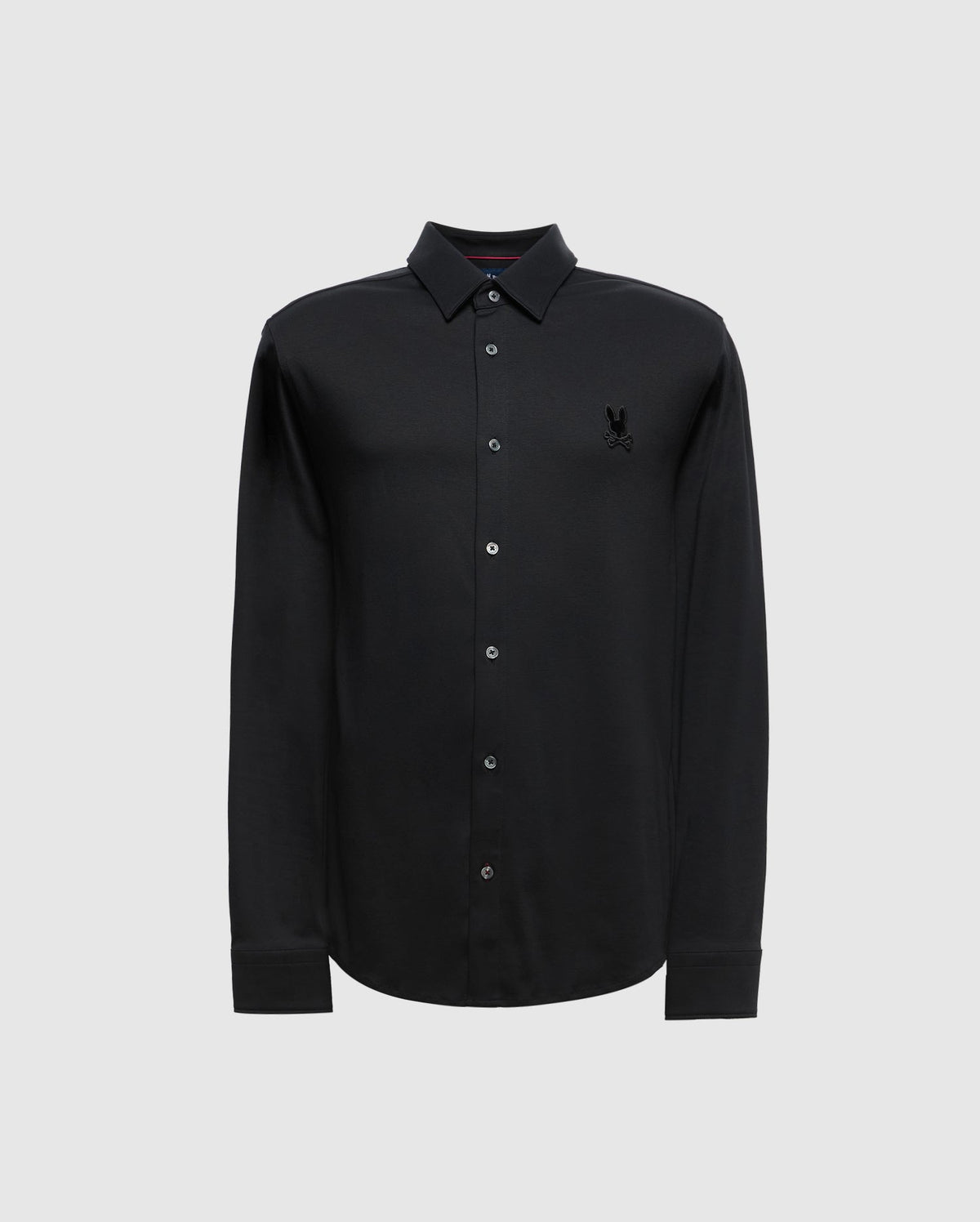 The Psycho Bunny Men's Interlock Knit Shirt (B6C188E200) is a stylish black knit shirt for men, featuring long sleeves and a pointed collar on a plain background. Made from 100% Pima cotton, its luxurious feel is enhanced by the mercerized knit fabric and a subtle embroidered logo on the chest.