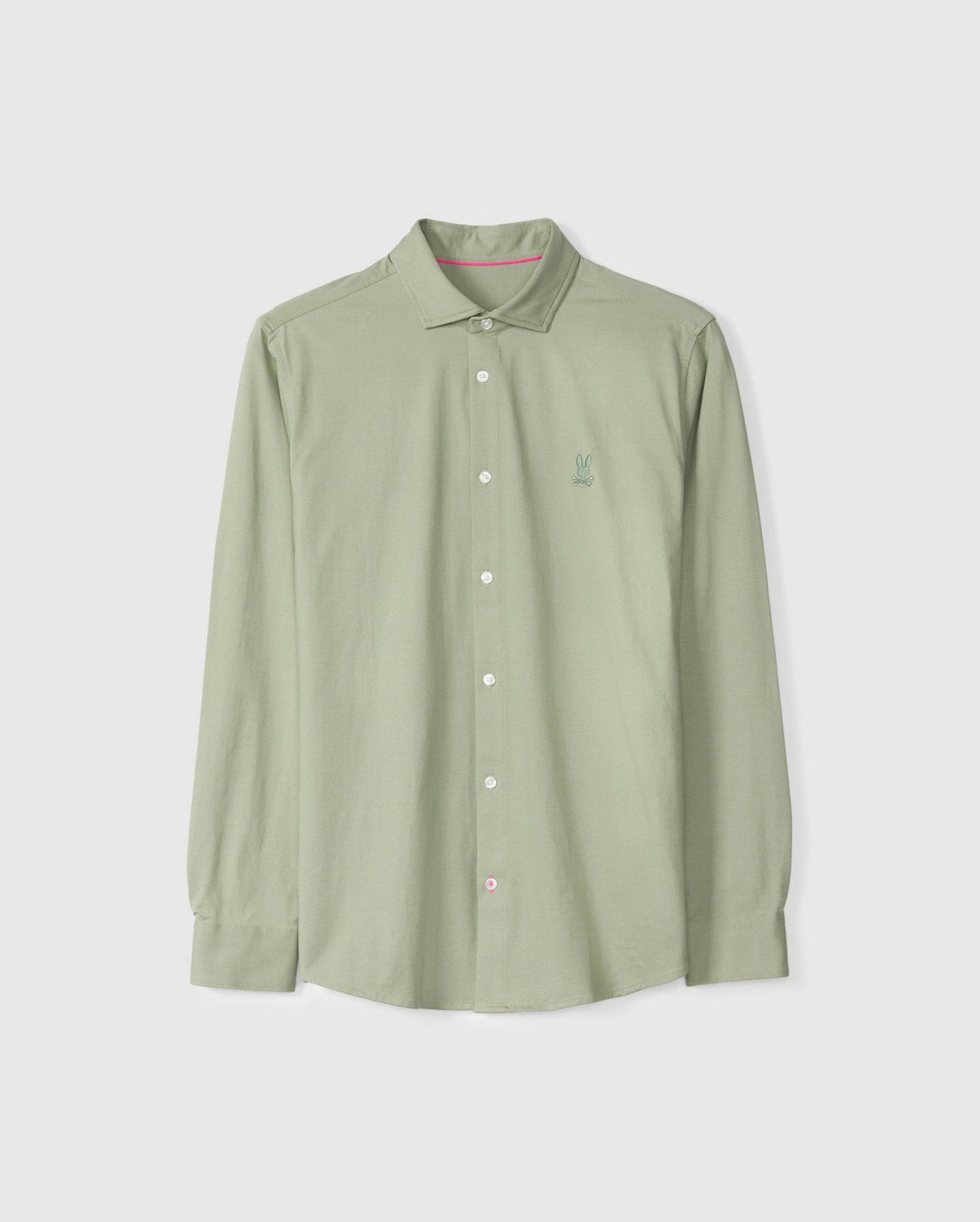 Displayed against a plain background is the MENS BRENDAN JERSEY SHIRT - B6C749D200 by Psycho Bunny, featuring a light green long-sleeve button-up design crafted from soft Pima cotton jersey. It is enhanced by white buttons and adorned with a small embroidered chest Bunny for added charm.