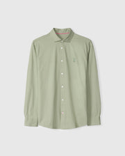 Displayed against a plain background is the MENS BRENDAN JERSEY SHIRT - B6C749D200 by Psycho Bunny, featuring a light green long-sleeve button-up design crafted from soft Pima cotton jersey. It is enhanced by white buttons and adorned with a small embroidered chest Bunny for added charm.