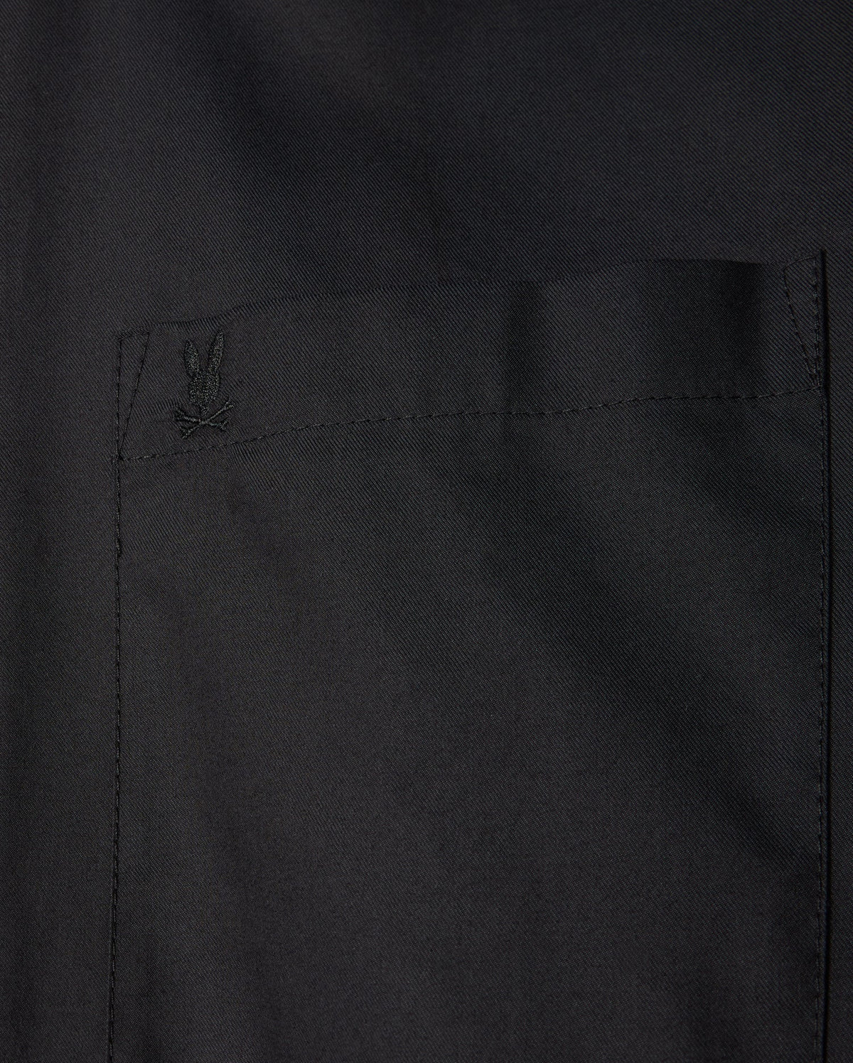 The Psycho Bunny MENS JARED COTTON MODAL SHIRT - B6C774D200 is a premium black shirt featuring a tone-on-tone logo embroidered on the pocket.
