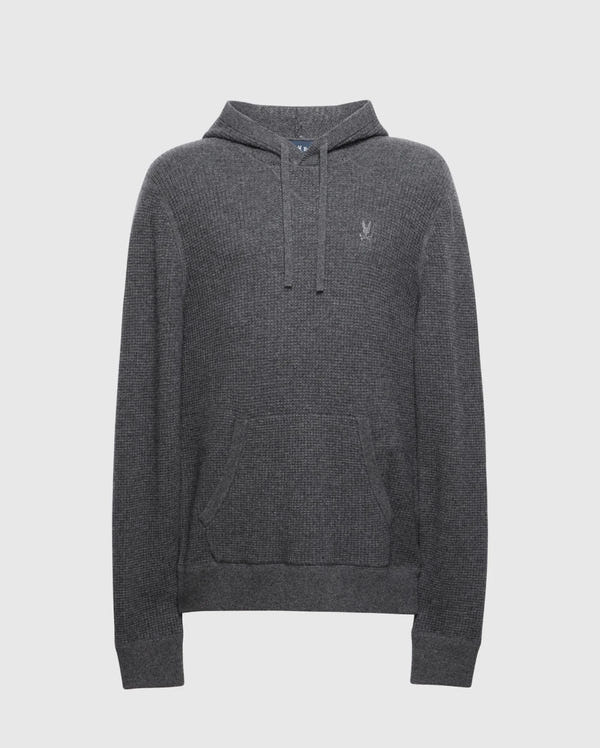 The Psycho Bunny MENS LEVAN WAFFLE HOODED SWEATER (B6E246E200) is a gray cashmere-wool hoodie with textured fabric, adjustable drawstrings, a front kangaroo pocket, and an embroidered chest bunny logo, adding charm to the plain white background.