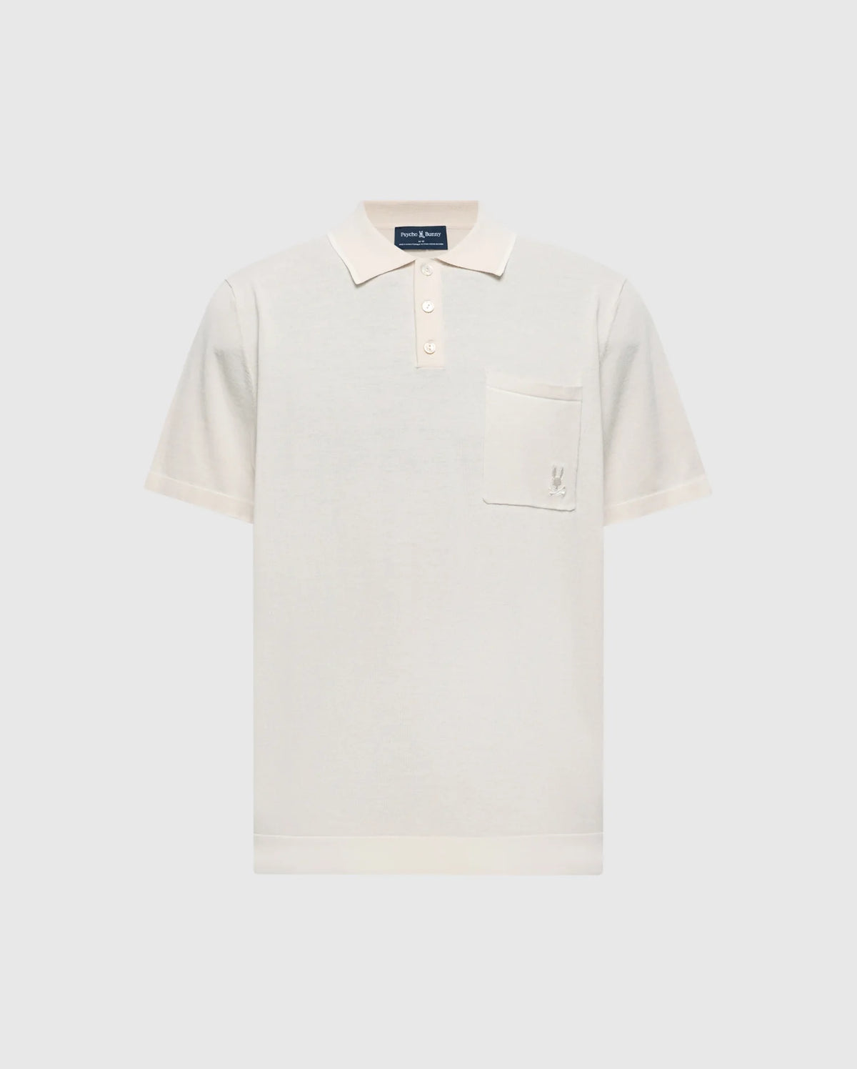The cream-colored Psycho Bunny Longford Polo (MENS LONGFORD FINE KNIT POLO - B6E500F200) is crafted from fine-knit cotton and features a classic collar, three-button placket, chest pocket with an embroidered Bunny, all on a plain background.