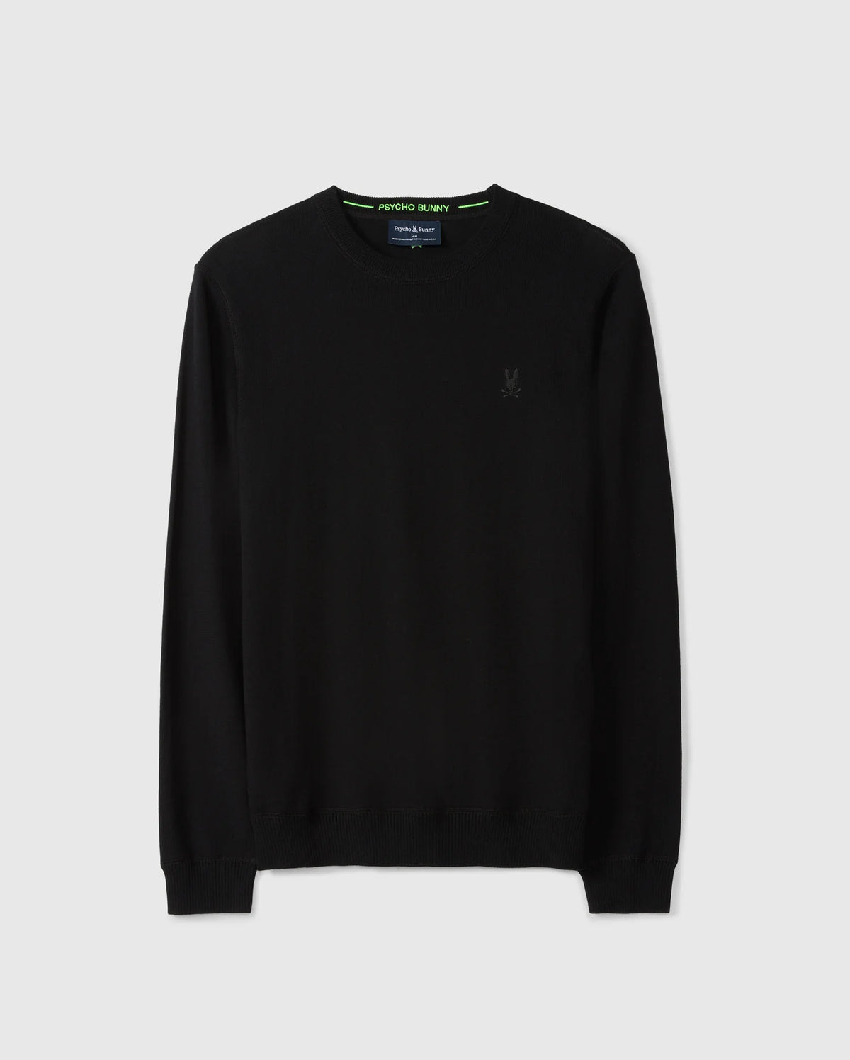 Introducing the Psycho Bunny Men's Belmore Extra Fine Cotton Sweater – B6E832D200. This elegant black sweater is meticulously crafted from extrafine cotton and showcases a discreet embroidered bunny logo on the left chest. It features a classic round neckline, complemented by ribbed cuffs and hem for timeless style. Presented on a light gray background, this piece underscores premium stitching for a touch of refined elegance.