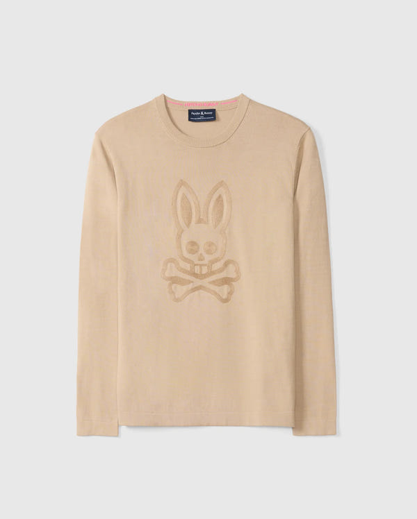 The Psycho Bunny Men's Cory Chainstitch Cotton Sweater, model number B6E893D200, is a lightweight cotton knit featuring a tonal skull and crossbones with bunny ears design on the front. It boasts a round neckline and long sleeves adorned with intricate chainstitch embroidery, all set against a plain white background.