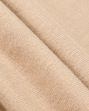 Here's a close-up of the MENS CORY CHAINSTITCH COTTON SWEATER by Psycho Bunny. This beige sweater features a lightweight cotton fabric with a textured, woven pattern, draped in gentle folds to highlight its soft and flexible nature.