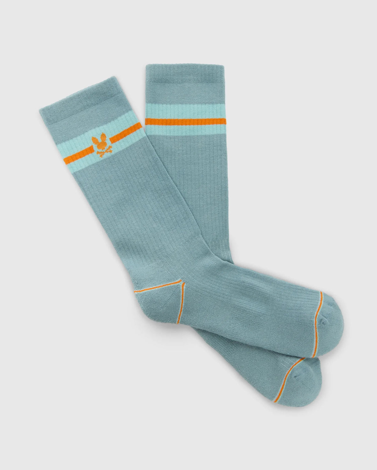 Psycho Bunny's MENS SPORT SOCK - B6F150E200 in teal features light blue and orange stripes with a rib knit stretch design. One sock has an embroidered yellow bird logo, while orange accents the heel and toe. Made from luxurious Peruvian Pima cotton, they have a light gray background.