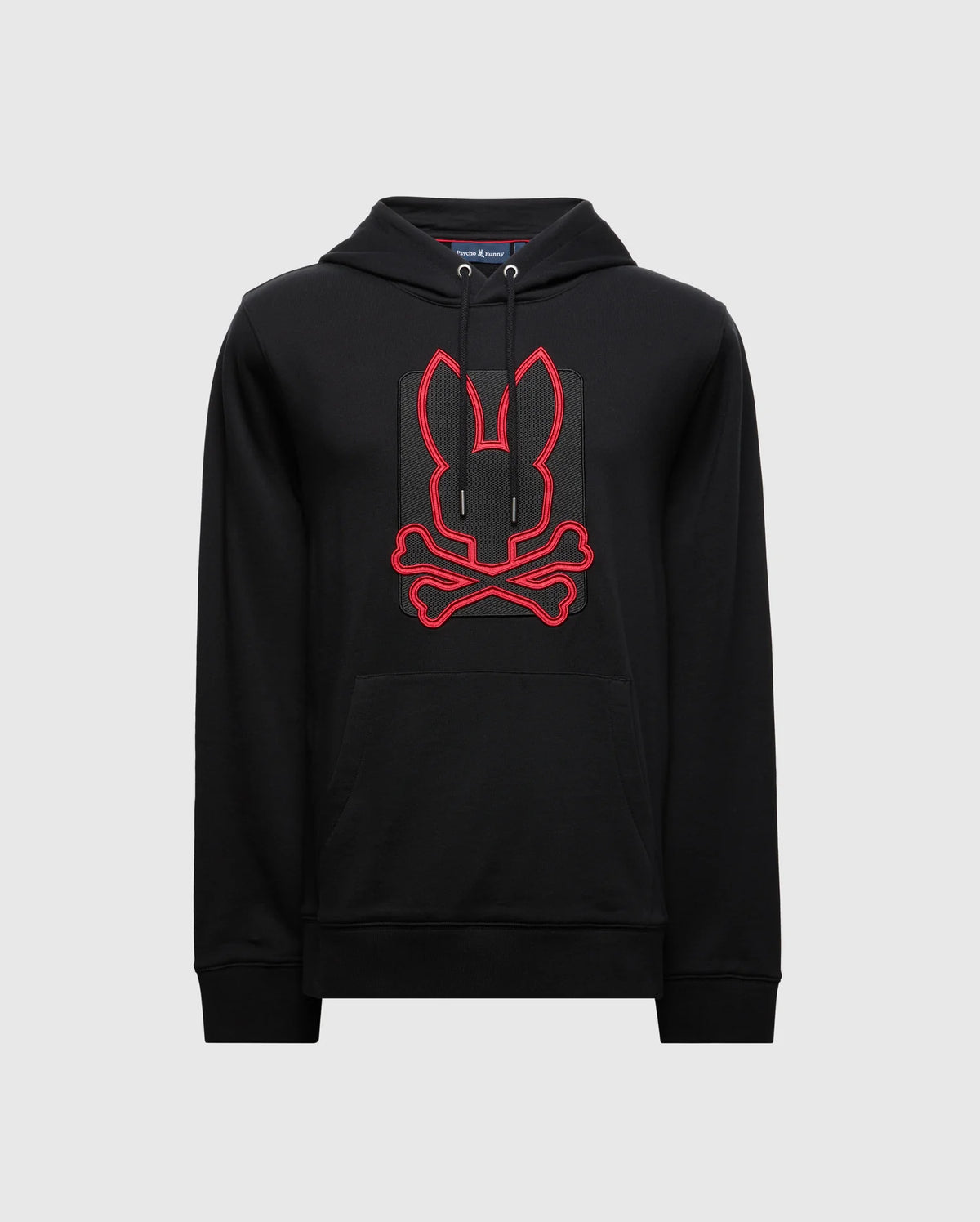 Introducing the Psycho Bunny MENS PIERCE ESSENTIAL FRENCH TERRY HOODIE - B6H135E200, a black cotton hoodie showcasing a striking red graphic of a stylized rabbit with crossbones prominently on the front. This bold design is centrally placed, enhancing its fashionable allure. The hoodie includes a front pocket and drawstring hood, presented against an understated plain background.