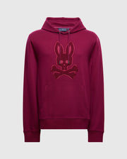 The Psycho Bunny MENS PACIFIC HIGH PILE CHENILLE HOODIE - B6H930D200, crafted in luxurious cotton with a rich maroon color, features an embroidered bunny with crossed bones on the front. This hoodie includes a convenient kangaroo pocket and a hood equipped with drawstrings, beautifully set against a plain white background.