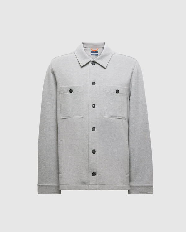 The BEDFORD SHIRT JACKET (B6J290B200) by Psycho Bunny features a gray design with two chest pockets and black buttons, presented against a plain white background.