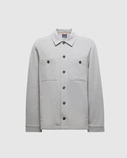 The BEDFORD SHIRT JACKET (B6J290B200) by Psycho Bunny features a gray design with two chest pockets and black buttons, presented against a plain white background.