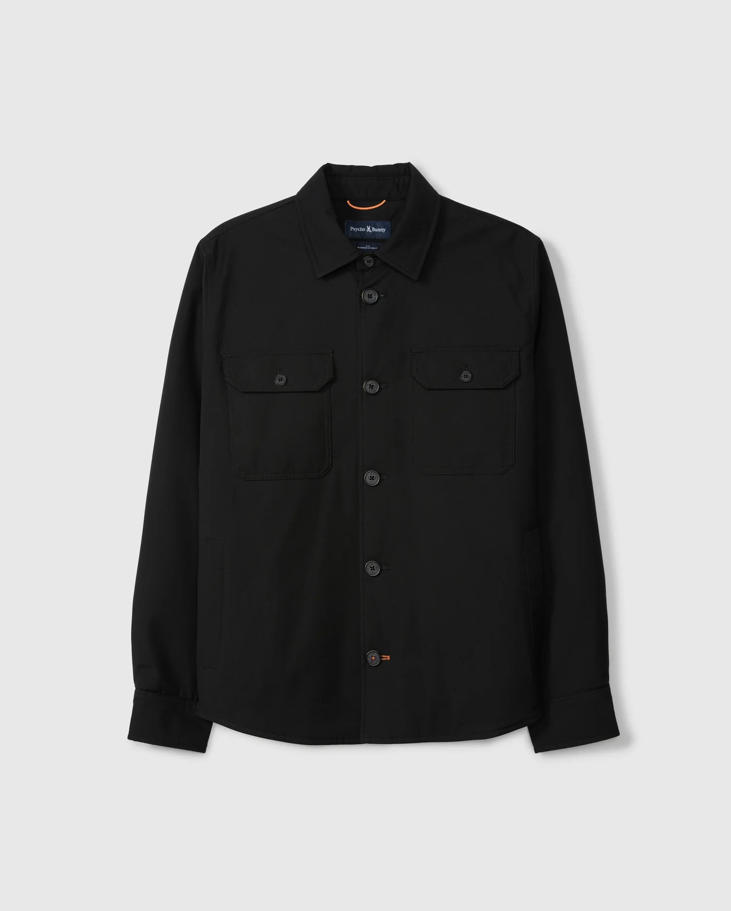The Psycho Bunny MENS HILLCREST PADDED SHACKET (B6J936D200) is a black button-up shirt with neon lining, long sleeves, and two chest patch pockets.