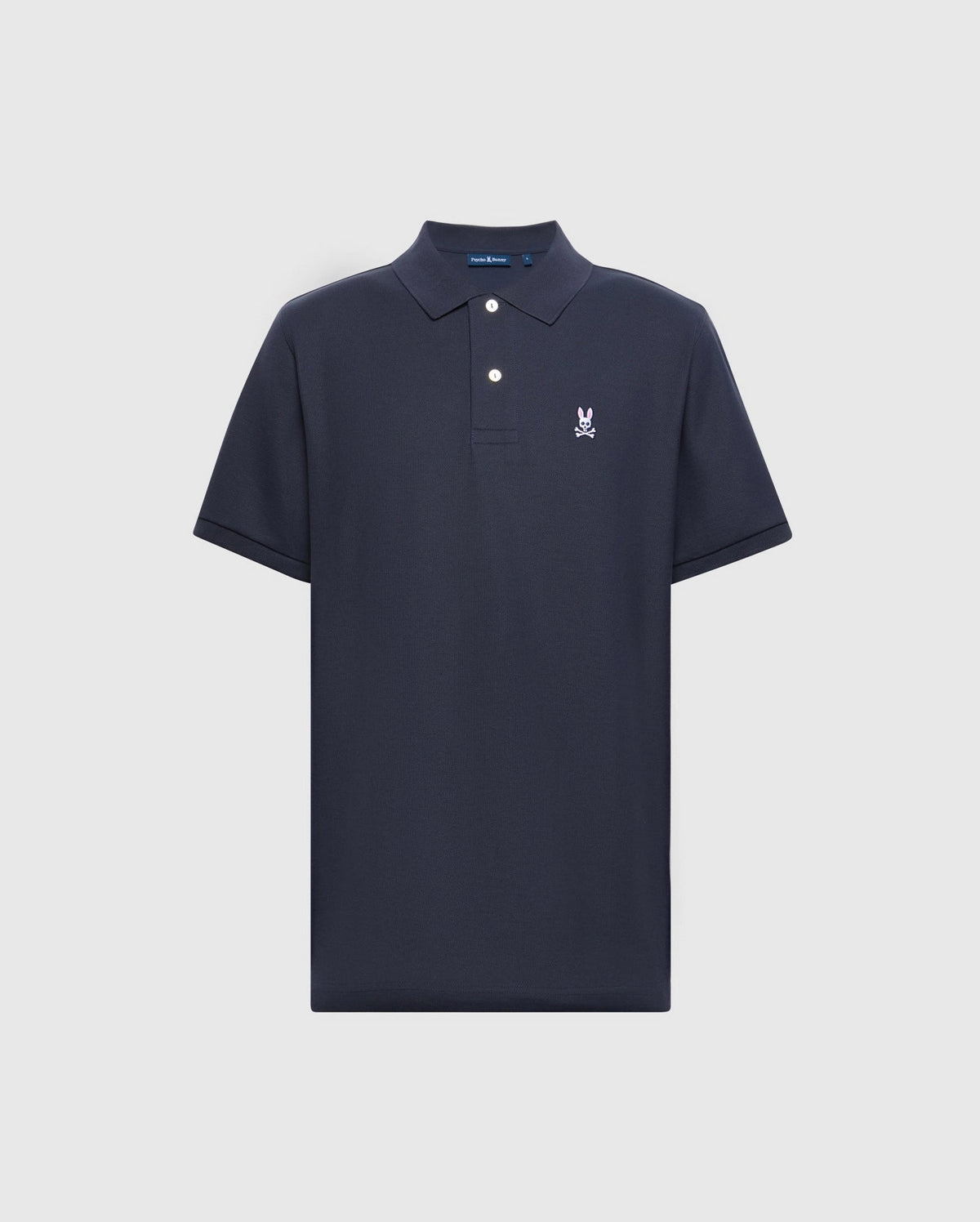 This navy blue men's classic polo, product code B6K001ARPC from Psycho Bunny, is crafted from Pima cotton and features short sleeves. It is adorned with the signature Psycho Bunny logo on the left chest and boasts a classic collar with two white buttons on the placket for a timeless style.