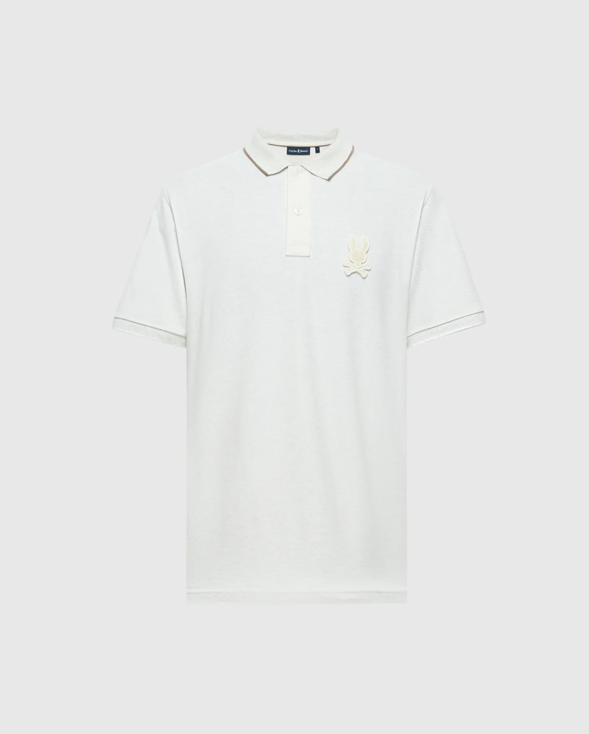 The Psycho Bunny MENS ELDORADO PIQUE POLO (B6K105E200) is a plain white shirt made from luxurious Peruvian Pima cotton. It features short sleeves, a classic collar with a three-button placket, a regular fit, and an embroidered logo on the left chest against the white fabric.