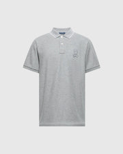 The Psycho Bunny MENS ELDORADO PIQUE POLO - B6K105E200 in gray is crafted from soft Pima cotton, featuring short sleeves, a collared neckline, and a three-button placket with Mother-of-Pearl buttons. It has an embroidered design on the left chest for a minimalist and elegant style.