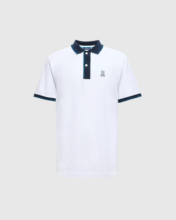 Introducing the Psycho Bunny Men's Brandon Pique Polo - B6K280E200, a luxurious white shirt with a dark collar and sleeve trim. It features a small embroidered logo of a cartoon bunny on the left chest. Designed for both comfort and style, this premium quality polo effortlessly enhances any wardrobe.