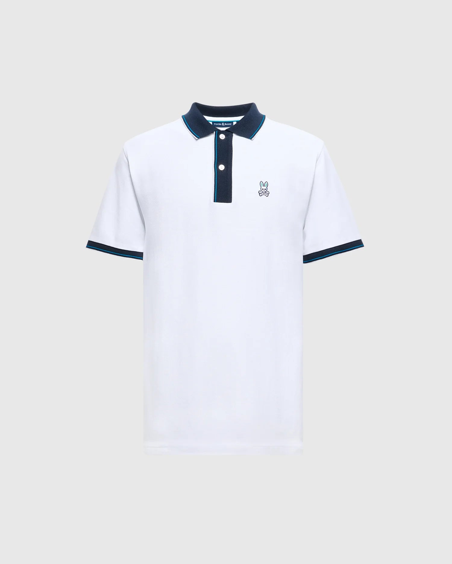 Introducing the Psycho Bunny Men's Brandon Pique Polo - B6K280E200, a luxurious white shirt with a dark collar and sleeve trim. It features a small embroidered logo of a cartoon bunny on the left chest. Designed for both comfort and style, this premium quality polo effortlessly enhances any wardrobe.