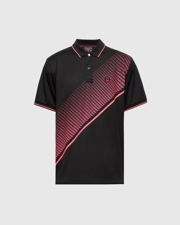 The MENS MACK SPORT PIQUE POLO by Psycho Bunny features a black design with a red diagonal geometric pattern, moisture-wicking fabric, and red piping on the collar and sleeves. A small red circular emblem on the left chest combines style and performance effortlessly.