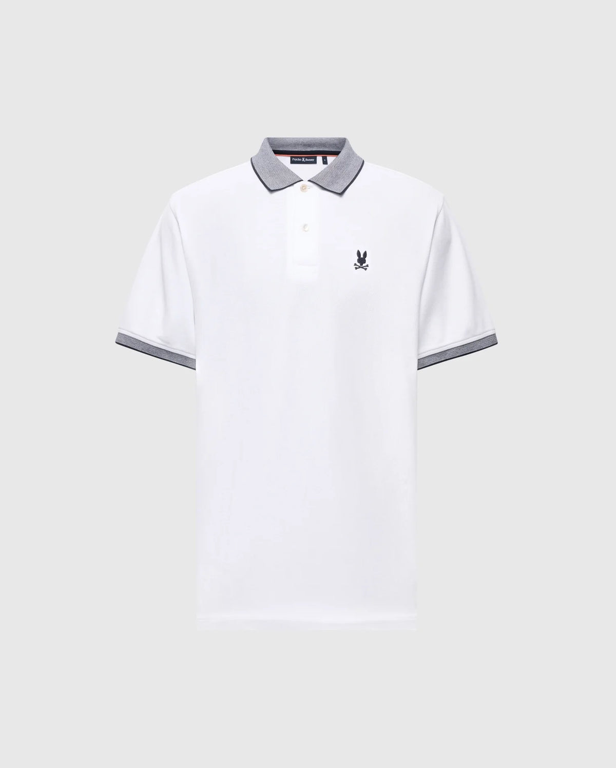 The MENS JONAS STRIPE COLLAR PIQUE POLO by Psycho Bunny features a white Pima cotton fabric with a gray collar and sleeves, three buttons, and a small embroidered bunny logo on the left chest, enhancing its subtle elegance.