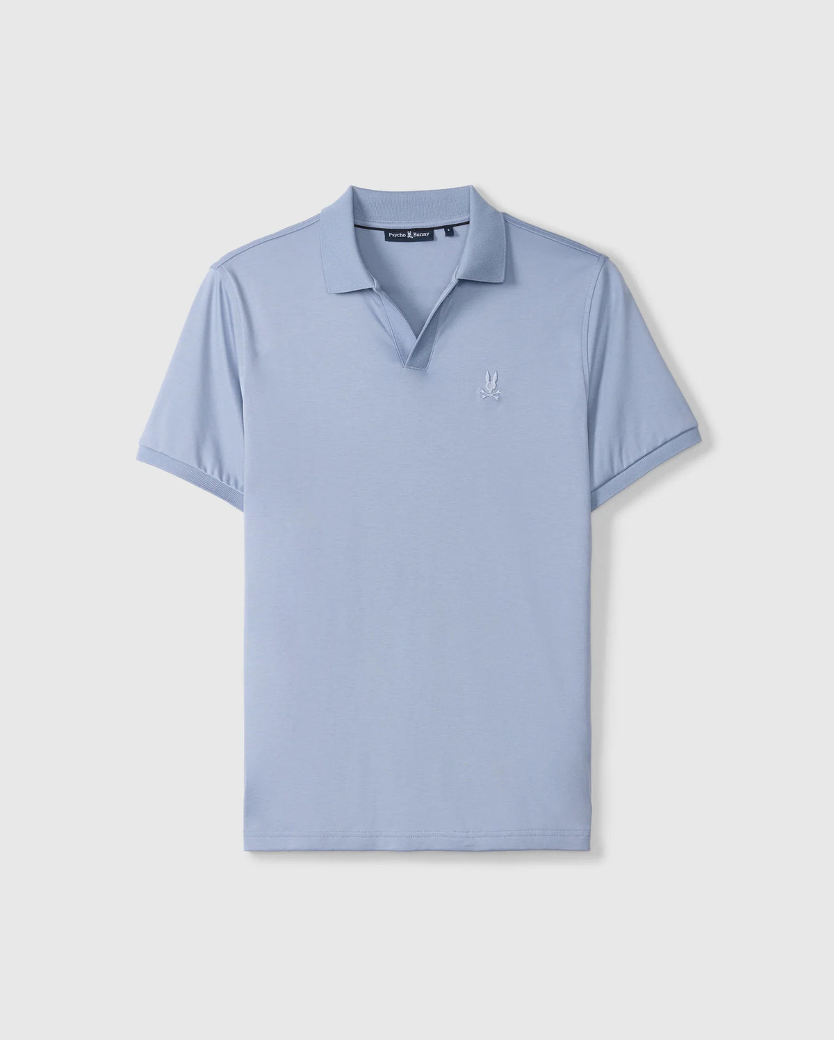 The Psycho Bunny Men's Broadway Mercerized Pima Polo Shirt (B6K891D200) in light blue features short sleeves, a collar, and a small embroidered logo on the left chest. Crafted from mercerized Pima cotton, it offers durable luster on a plain background.