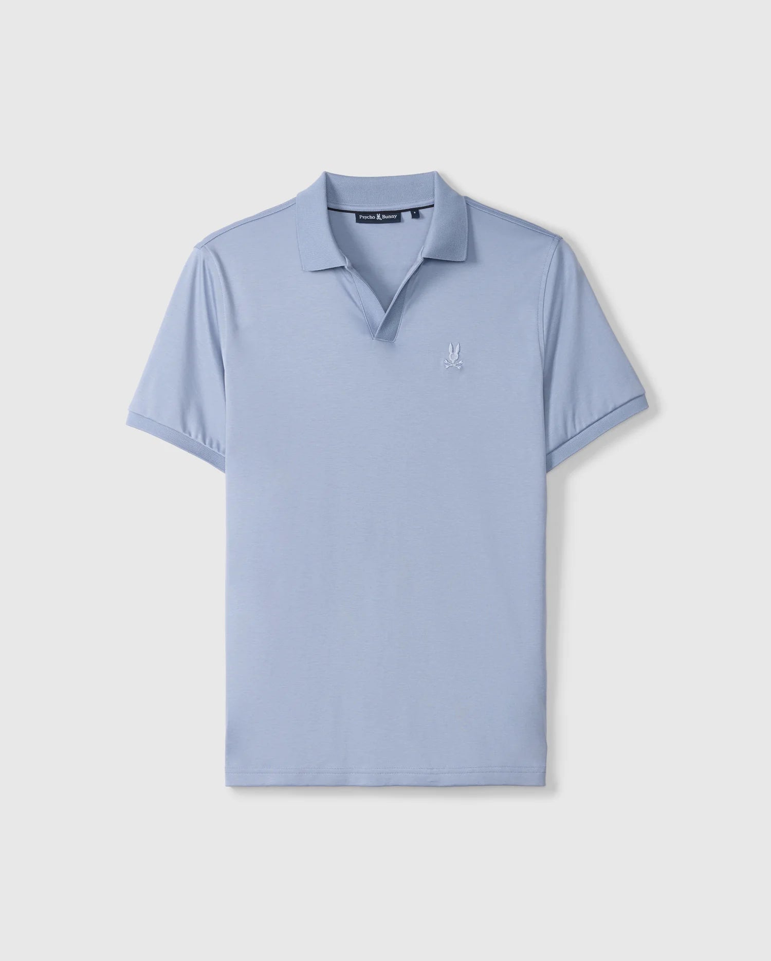 The Psycho Bunny Men's Broadway Mercerized Pima Polo Shirt (B6K891D200) in light blue features short sleeves, a collar, and a small embroidered logo on the left chest. Crafted from mercerized Pima cotton, it offers durable luster on a plain background.