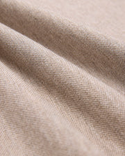Close-up of Psycho Bunny's MENS JAMES PREMIUM PIQUE POLO SHIRT fabric, crafted from premium materials, showing a fine weave with soft folds. The smooth, uniform texture has gentle undulations and subtle shadows—ideal for a durable yet luxurious wear.