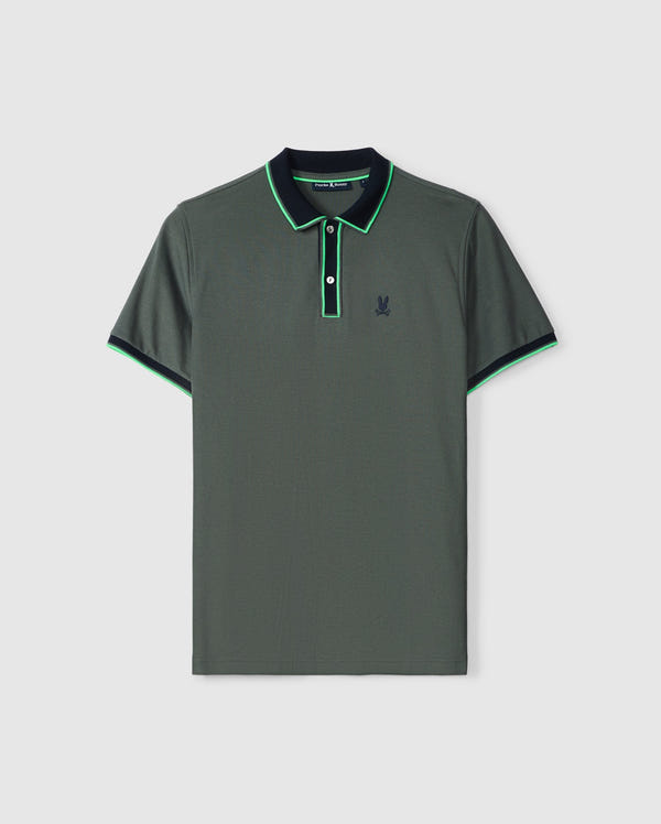 Introducing the Psycho Bunny MENS KENT PIQUE POLO SHIRT - B6K951D200, a stylish men's polo in dark green crafted meticulously from premium Pima cotton. This short-sleeved shirt features a small embroidered logo on the left chest, while the collar and sleeves are artistically detailed with green and blue accents. The button placket neckline completes this elegant design.