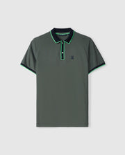 Introducing the Psycho Bunny MENS KENT PIQUE POLO SHIRT - B6K951D200, a stylish men's polo in dark green crafted meticulously from premium Pima cotton. This short-sleeved shirt features a small embroidered logo on the left chest, while the collar and sleeves are artistically detailed with green and blue accents. The button placket neckline completes this elegant design.