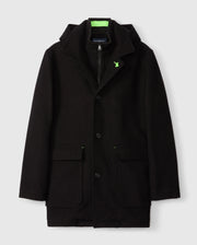 The Psycho Bunny MENS STAFFORD WOOL BLEND COAT - B6N551D200 is an elegant black coat with a high collar, zippered inner lining, green embroidered chest logo, buttoned front, and two large front pockets. Photographed against a plain white background.