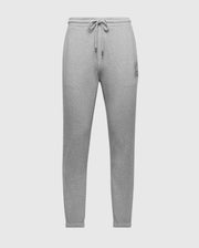 Introducing Psycho Bunny's MENS ELDORADO BRUSH BACK JOGGER - B6P285E200: gray sweatpants with an elastic waistband, ankle cuffs, and adjustable drawstring for ultimate comfort. Stylishly sleek, they feature a small embroidered logo on the upper left thigh against a white backdrop.