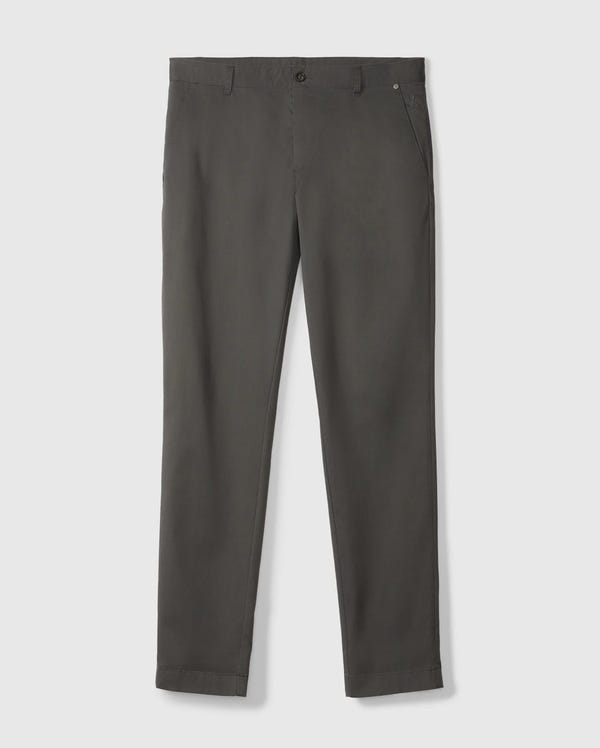Displayed on a white background, the Psycho Bunny MENS GILMAN CHINO PANT - B6P393Z1WB is a pair of dark olive green stretch trousers. These chino pants showcase a slim fit style and include features like button and zipper closure, belt loops, and side pockets for added comfort.