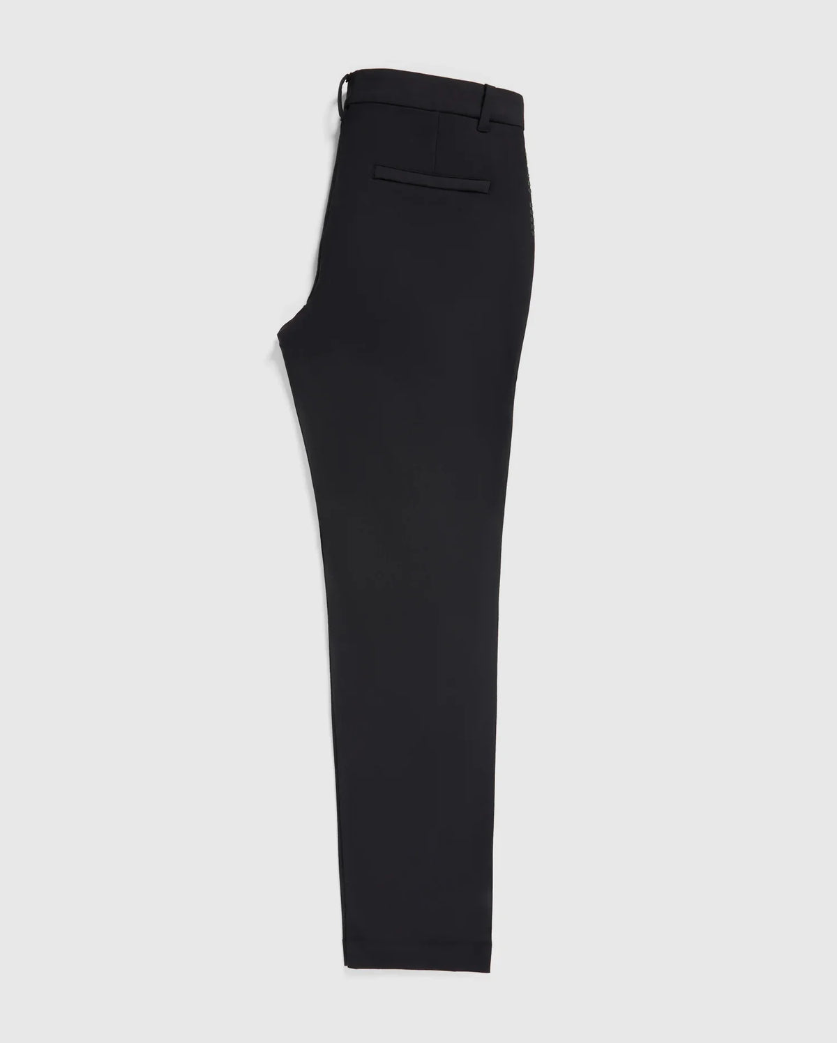 A single black trouser leg crafted from stretch cotton-nylon textile, with a visible waistband and side tab detail, displayed against a plain white background. This is the MENS GABLE REGULAR FIT SPORT PANT by Psycho Bunny.