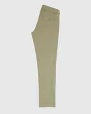Side view of Psycho Bunny's MENS DELANCY CHINO PANTS - B6P784U1CO, showcasing classic-fit stretch cotton with a flat front and a buttoned back pocket. The khaki chinos are neatly folded against a white background, with waistband and hem aligned.