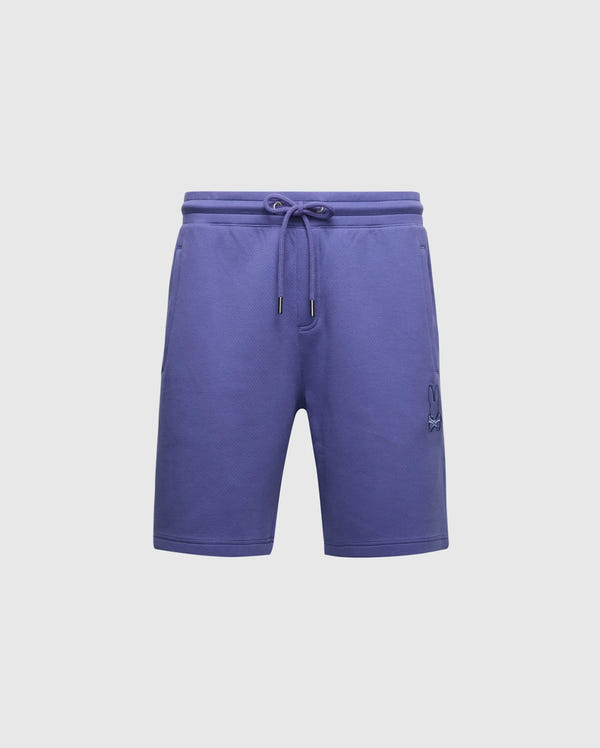 The Psycho Bunny Men's Dacano Perforated Sweatshorts in purple boast a sporty, athletic fit. Crafted from a performance cotton blend, they feature an elastic waistband with drawstring and a subtle front left logo.