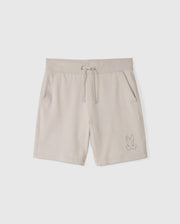 The MENS WALTER LIGHTWEIGHT SWEATSHORT - B6R477D200 by Psycho Bunny are beige, high-quality cotton blend shorts with an elastic waistband, drawstring, and side pockets. They feature an embroidered outline of a rabbit on the lower left leg and offer a regular fit for all-day comfort.