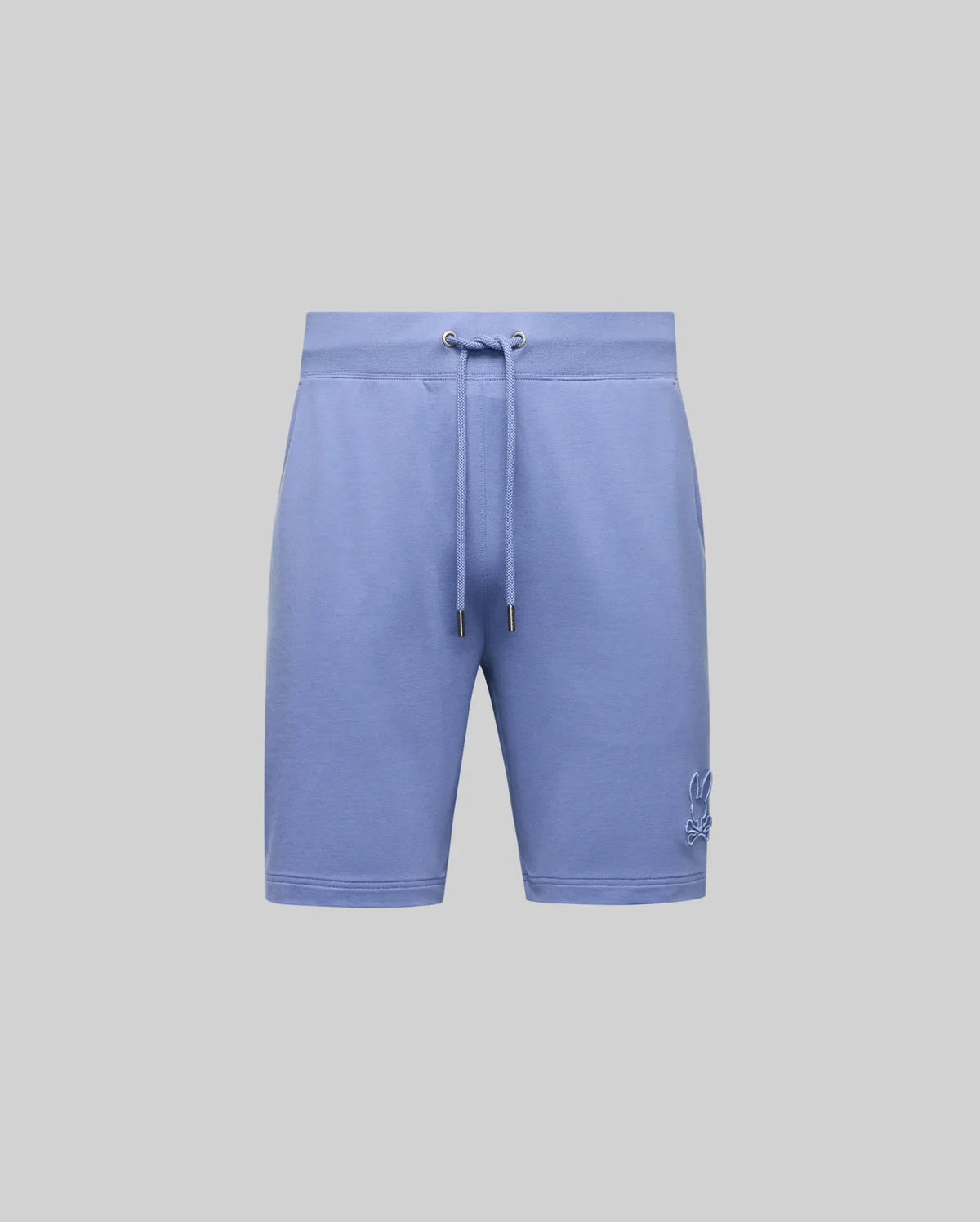 The Psycho Bunny Men's Levanzo French Terry Sweatshort (B6R578F200) in light blue features soft micro French terry, side pockets, and a small embroidered bunny logo on the lower left leg, shown against a plain gray background.