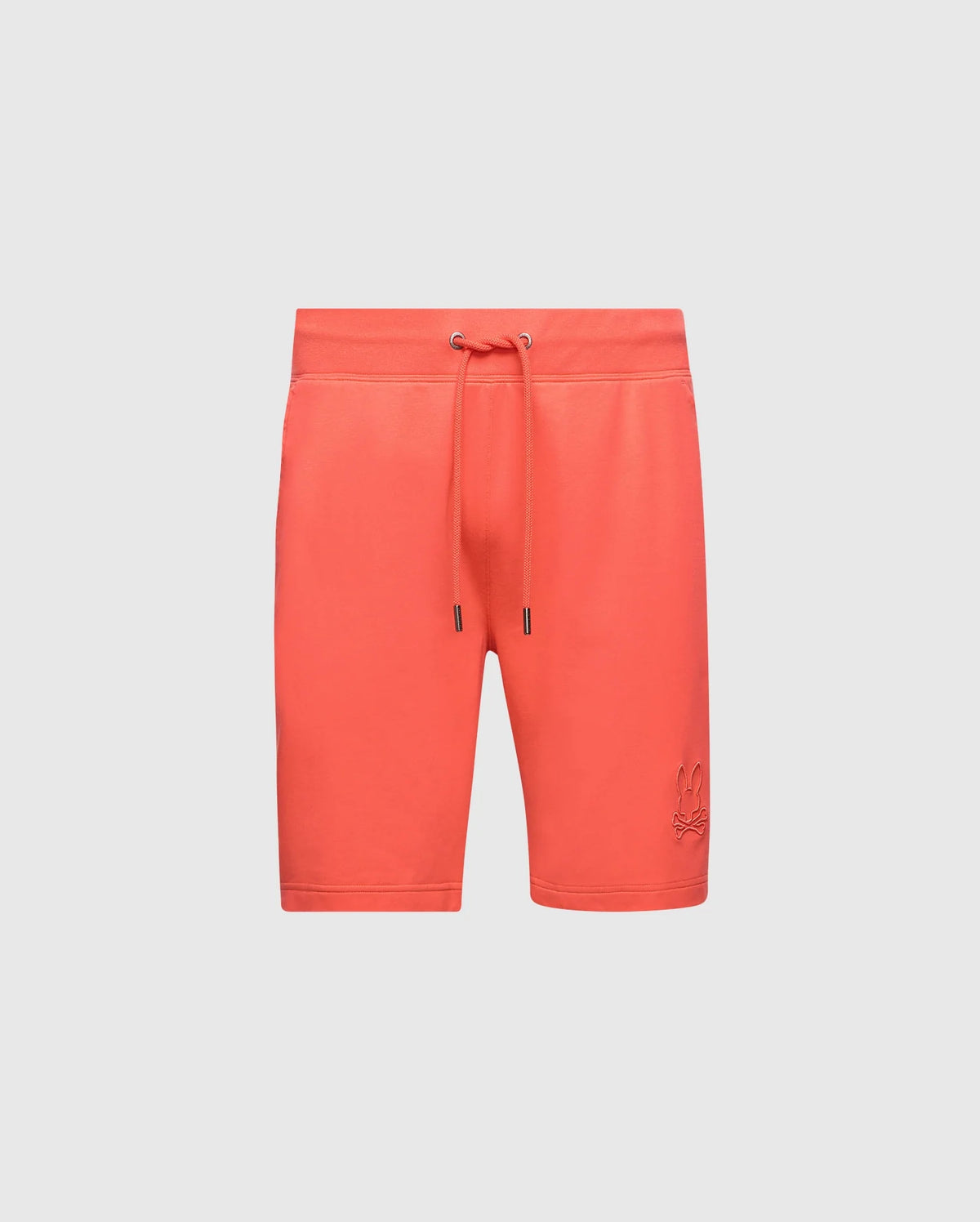 The Psycho Bunny Men's Levanzo French Terry Sweatshort-B6R578F200 showcases unmatched comfort with a relaxed fit in coral, featuring an embroidered logo on the lower left of micro French terry fabric against a plain light gray background.