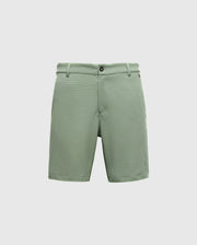 Psycho Bunny's Mens Shiro Knit Honeycomb Short in light green features a button and zip closure, belt loops, and side pockets. Made from honeycomb piqué fabric, it is presented against a plain white background.