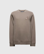 The Psycho Bunny MENS PIERCE PEACHED TERRY CREW - B6S278E200 sweatshirt in taupe features a small cartoon character embroidered on the upper left chest. Made from high-quality cotton, it includes ribbed cuffs, hem, and a classic crew neckline for a stylish appearance.