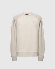 The Psycho Bunny MENS ARCHIE MELANGE COLOR BLOCK SWEATSHIRT - B6S630F200 is a light beige crewneck with raglan sleeves and an embroidered Bunny logo on the chest, featuring a ribbed collar, cuffs, and hem. Ideal for monochrome styling.