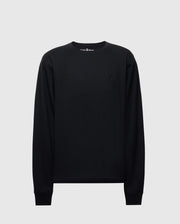 The Psycho Bunny MENS TAYLOR PIQUE LONG SLEEVE TEE, crafted from Pima cotton, in black with long sleeves and a small embroidered Bunny logo on the left chest, is displayed on a light gray background.
