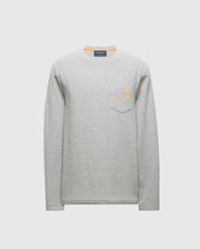 The Psycho Bunny MENS VAIL WAFFLE LOUNGE LONG SLEEVE TEE - B6T672E200 is a stylish men's light gray waffle knit tee with a crew neckline and a chest pocket on the left side. It features a small orange embroidered logo and is displayed on a plain white background.