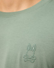 Get a closer look at the MENS ALBERTON LONG SLEEVE TEE - B6T867D200 by Psycho Bunny, crafted from luxurious Pima cotton. It showcases an embroidered bunny head logo with crossed bones on the chest.