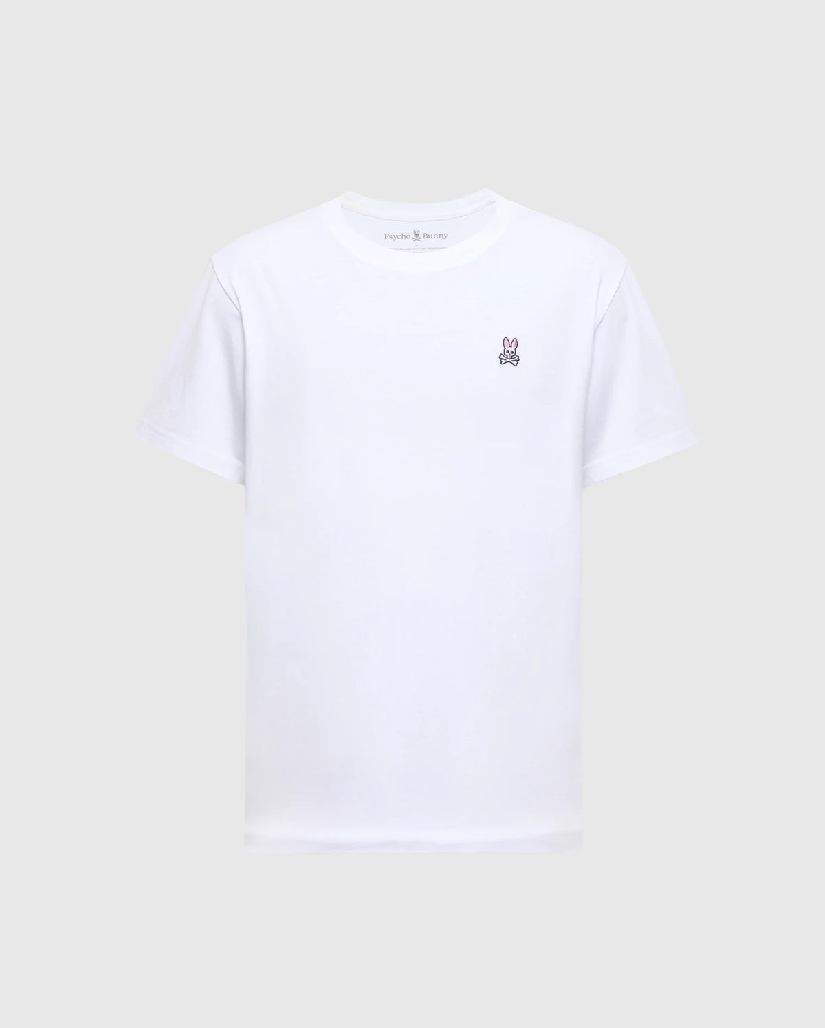 The MENS CLASSIC CREW NECK TEE - B6U014CRPC by Psycho Bunny is a versatile piece for any men's wardrobe, featuring a small embroidered bunny logo on the left chest, crafted from soft Pima cotton in plain white against a light grey background.