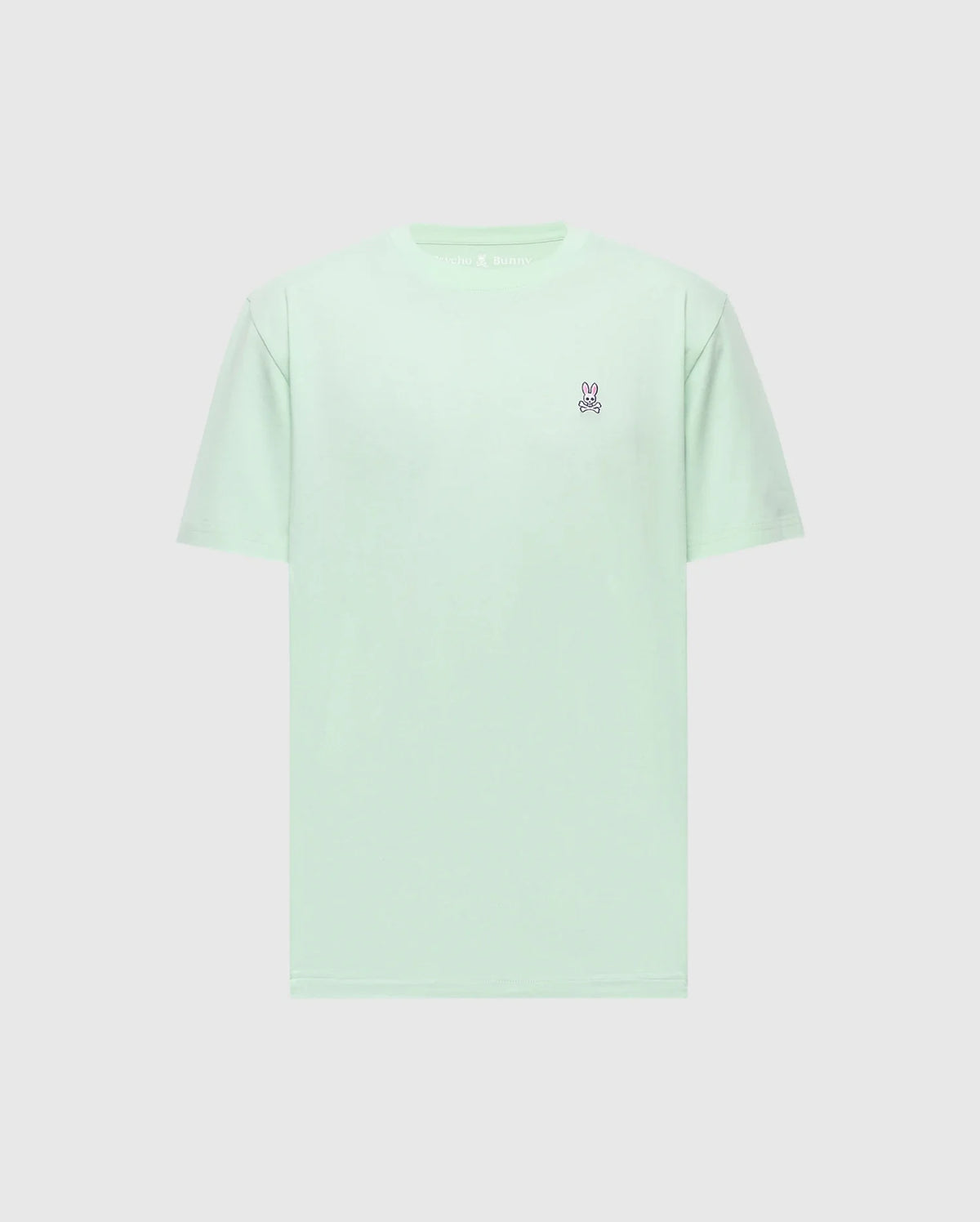 The Psycho Bunny MENS CLASSIC CREW NECK TEE (B6U014F200) features a light green hue and is crafted from soft Pima cotton, with a small embroidered bunny logo on the upper left chest. The tee is displayed against a plain light background, highlighting its simple, casual design.