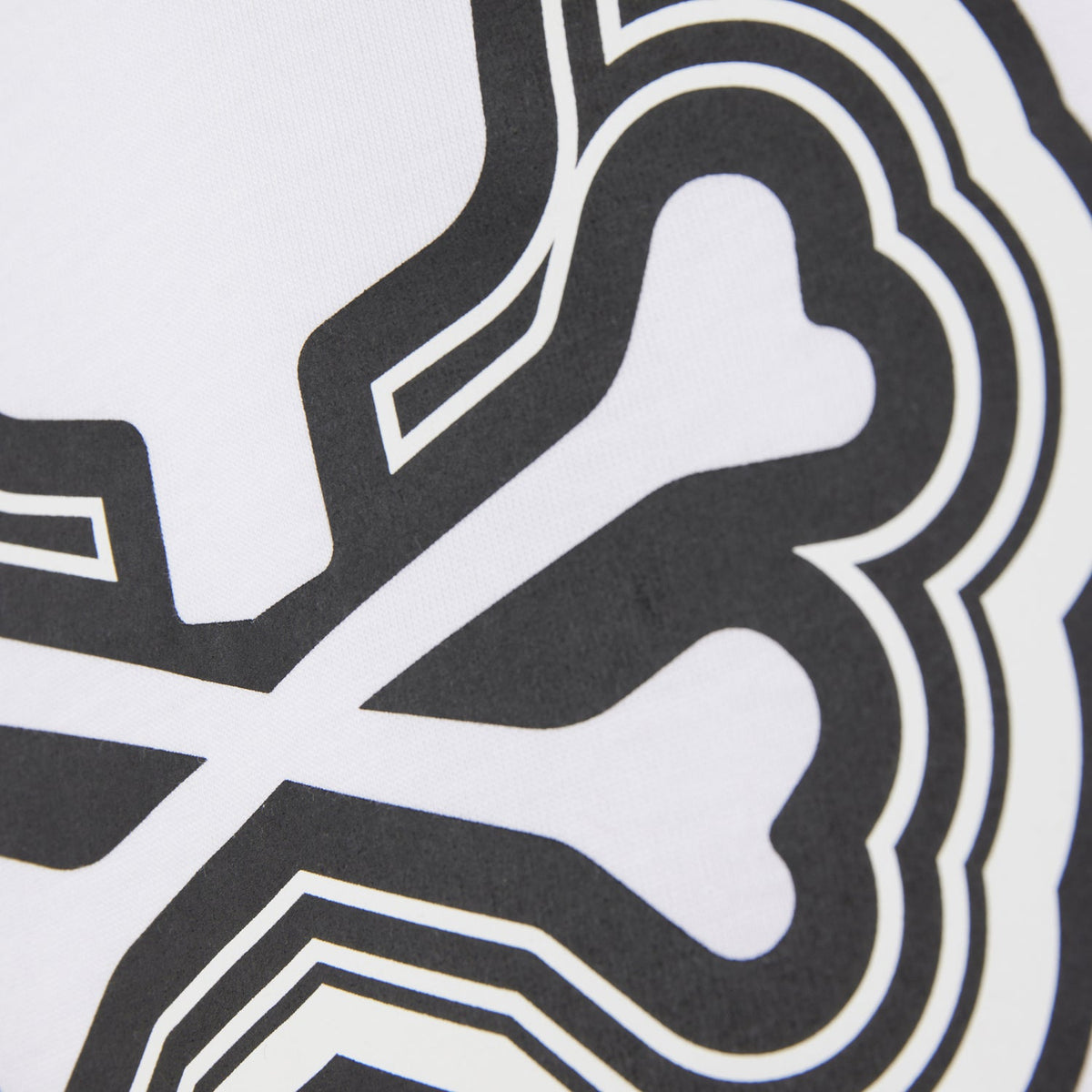 Close-up of a MENS MAYBROOK GRAPHIC TEE featuring bold black and white lines with abstract, curvilinear shapes on a Pima cotton background by Psycho Bunny.